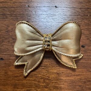 Vintage Satiny Gold Bow Brooch with Rhinestone Accent